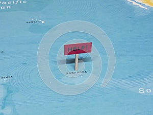 `HELP!` Sign with Pole on Borabora of the World Map