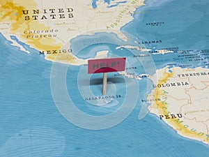 `HELP!` Sign with Pole on GalÃ¡pagos Islands of the World Map