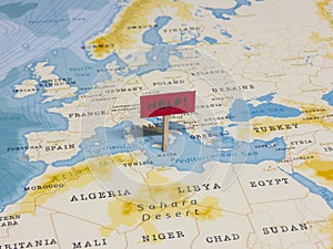 `HELP!` Sign with Pole on Malta of the World Map