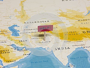 `HELP!` Sign with Pole on Pakistan of the World Map