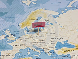 `HELP!` Sign with Pole on Poland of the World Map