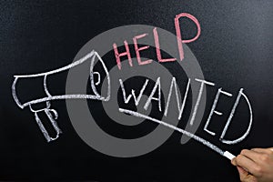 Help Wanted Concept Written On Blackboard