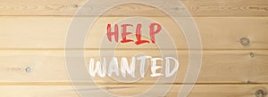 Help wanted and support symbol. Concept words Help wanted on beautiful wooden wall. Beautiful wooden wall background. Business,