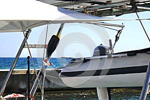 The helper on the sailboat at the port photo