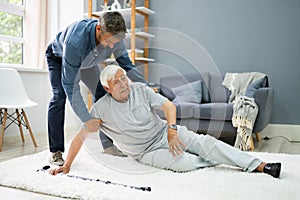 Helping Elder Senior Fallen Man