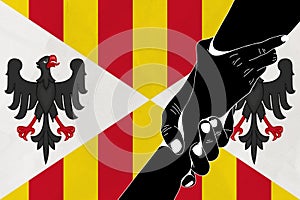 Helping hand against the Bandiera del Regno di Sicilia flag. The concept of support. Two hands taking each other. A helping hand photo