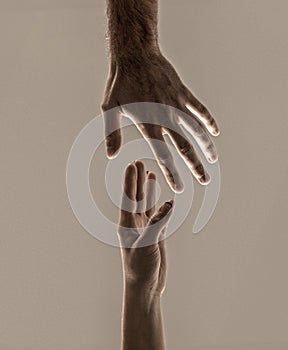 Helping hand concept and international day of peace, support. Closeup. Helping hand outstretched, isolated arm