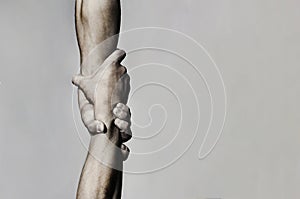 Helping hand concept and international day of peace, support. Helping hand outstretched, isolated arm, salvation. Close photo