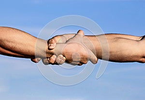 Helping hand concept and international day of peace, support. Two hands, helping arm of a friend, teamwork. Hands of on
