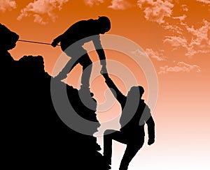 Helping hand between two climber