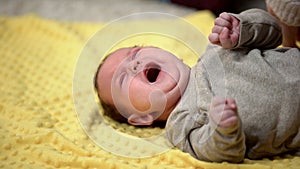 Helpless newborn crying, infant constipation problem, baby healthcare, colic photo