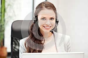 Helpline operator with laptop computer photo