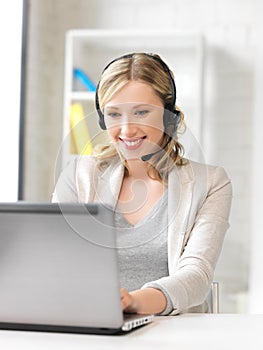 Helpline operator with laptop computer