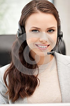 Helpline operator with laptop computer