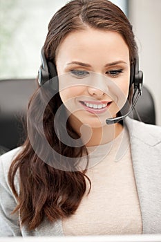 Helpline operator with laptop computer