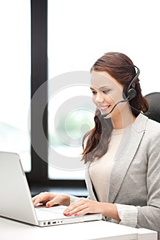 Helpline operator with laptop computer