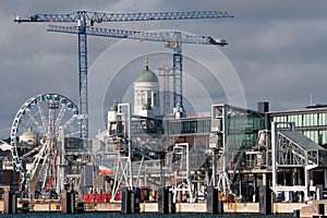 Helsinki, capital of Finland. The Lutheran cathedral, a Ferris wheel, construction cranes