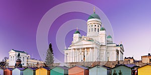 Helsinki, Finland. Christmas Xmas Market With Christmas Tree And Traditional Trading Houses Near Famous Lutheran