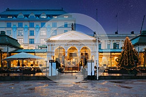 Helsinki, Finland. Colorful Night Dark Blue Starry Sky In Blue Colors With Sky Gradient. Famous Popular Place Is Cafe