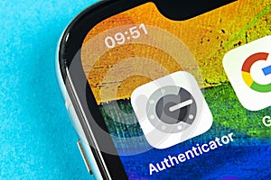 Google authenticator application icon on Apple iPhone X smartphone screen close-up. Google Authenticator app icon. Social network.