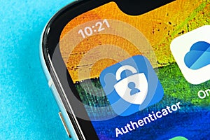 Microsoft authenticator application icon on Apple iPhone X smartphone screen close-up. Microsoft Authenticator app icon. Social ne