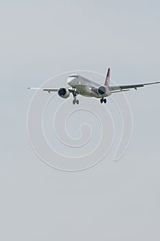 Helvetic Airways Embraer E-190-E2 jet landing on runway 14 in Zurich in Switzerland
