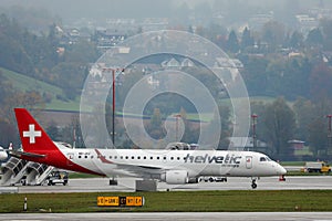 Helvetic Airways plane taxiing in Zurich Airport, ZRH