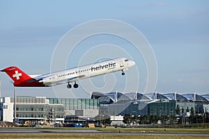 Helvetic Airways plane taking off from Munich Airport