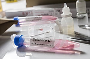 Hematological analysis with forensic test kit in a murder in a crime lab photo