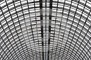 A hemispherical ceiling of glass and metal in modern building as background, texture