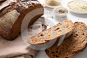 Hemp bread and hemp seeds on white background.