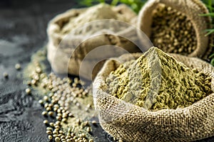 Hemp flour on dark background