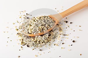 Hemp seeds in wooden spoon