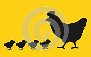 A hen with four tinny little chicks against a yellow backdrop