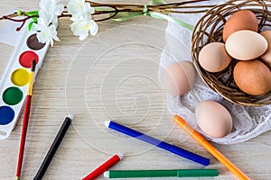 Hen`s eggs is prepared for painting with paints gouache and food markers for Easter.