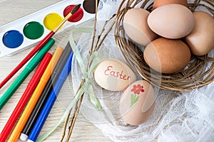 Hen`s eggs is prepared for painting with paints gouache and food markers for Easter.