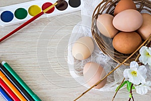 Hen`s eggs is prepared for painting with paints gouache and food markers for Easter.