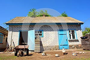 Henhouse and farm utensils photo