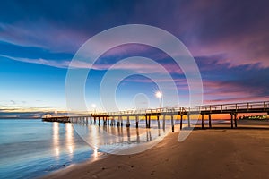 Henley Beach jetty at dusk with the tranquil sea
