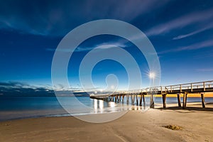 Henley Beach jetty illuminated at night