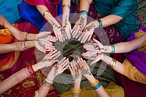 Henna Decorated Hands Arranged in a Circle photo