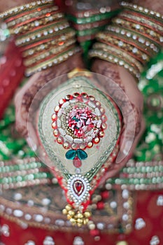 Henna tattoo on hand from indian wedding ceremony