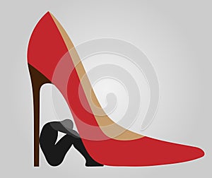 Henpecked - a man under a heel of woman shoes