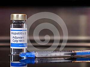 Hepatitis B adjuvant Cpg 1018 with syringe and copy space