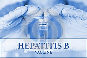 Hepatitis B vaccine. medical ampoule in the hands of a doctor. Vaccination awareness concept. Toned image. Soft blurred background