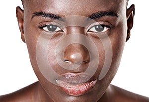 Her eyes will hypnotise....Studio portrait of a beautiful young african woman isolated on white.