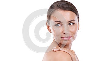 Her radiant beauty is the product of great skincare. a beautiful young woman isolated on white.