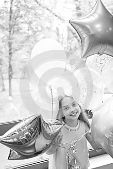 Her special day. Birthday celebration. Happiness and joy. Art balloons decorations service. Girl with balloons celebrate