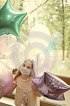 Her special day. Birthday celebration. Happiness and joy. Art balloons decorations service. Girl with balloons celebrate