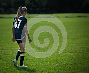 In her zone. Soccer field